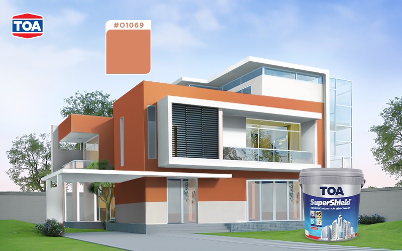 Một phòng khách được trang trí với các vật dụng màu xanh lá cây và tím